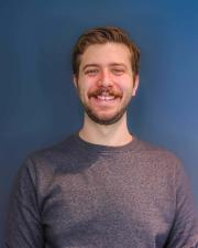 Photo of Alec Lininger, smiling at the camera
