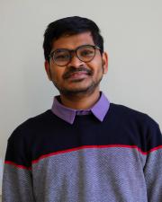 Photo of Apurba Adhikary, smiling at the camera