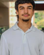 Photo of Jeshua Ruiz Irizarry, smiling at the camera